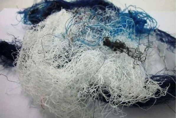 Lightweight wall panels made from waste textile fibres
