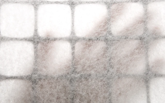 Geocomposite geogrid-geotextile