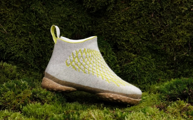 A 3D knitted sneaker made of dog hair and mycelium