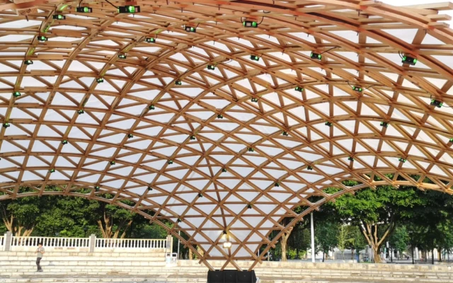 A bamboo-timber grid shell