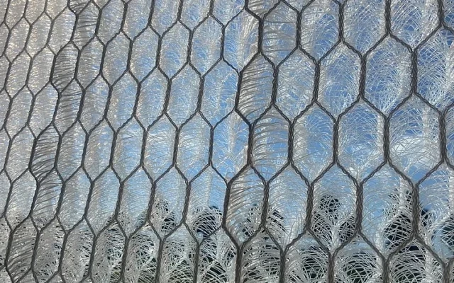 A façade material to harvest rain and cool buildings