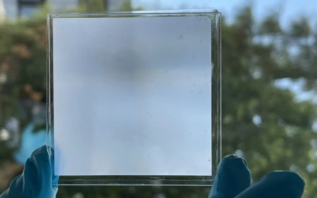 A transparent metamaterial for energy-efficient light and temperature regulation