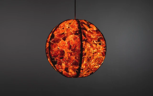 A lampshade made of orange peels