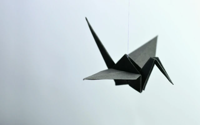 Kiri-Origami Unlocks High-Performance Stretchable Electronics
