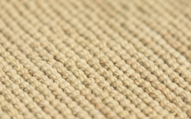 Seaweed dyed woolen carpet