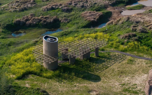 Wetland Caves Pavilion Integrates Bamboo and Concrete Within a Wetland Landscape